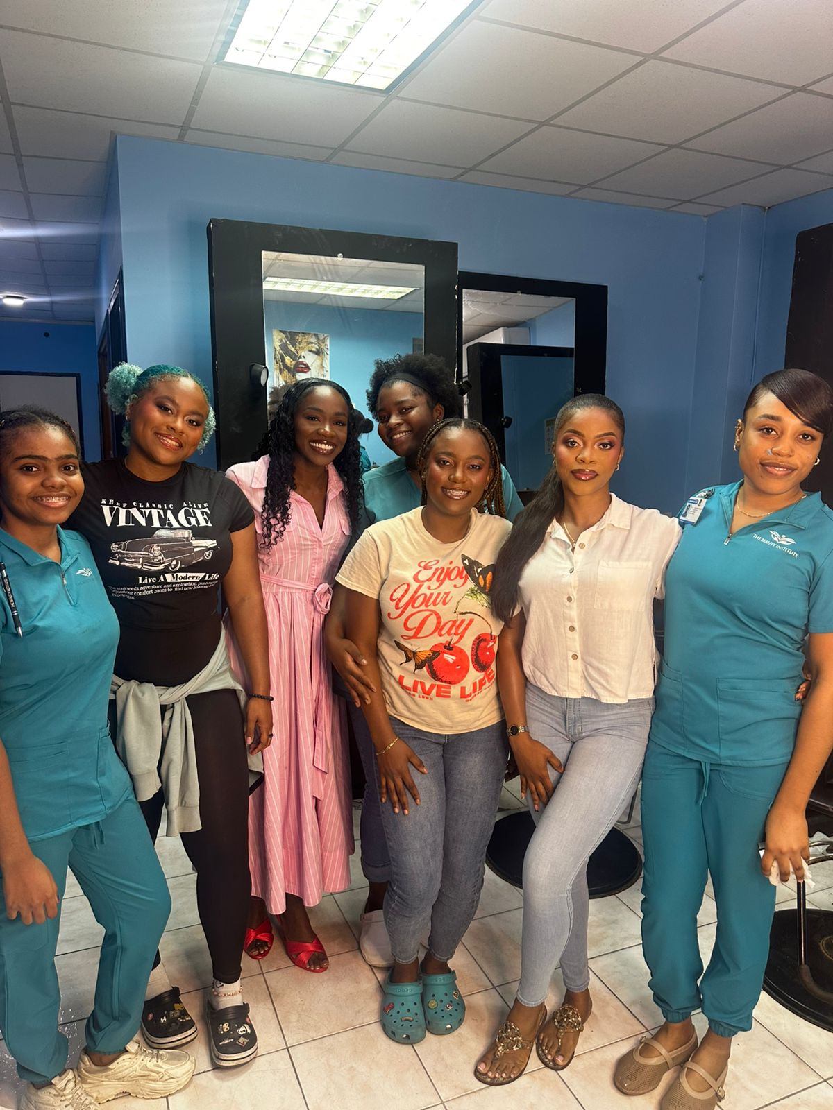 Beauty University students and principal